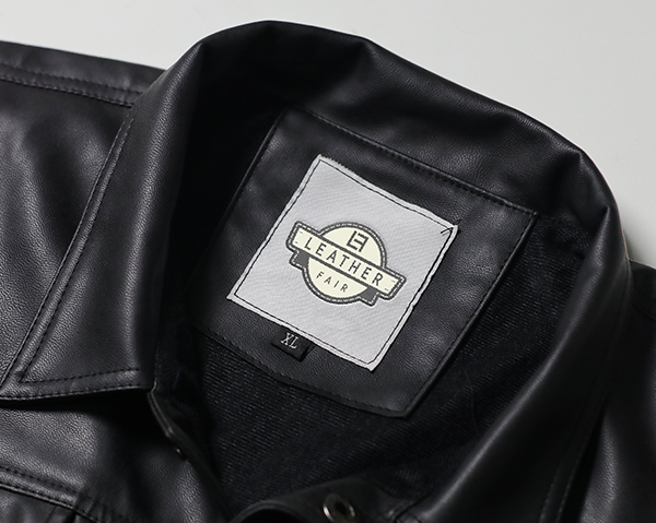 "LEATHER FAIR" tag on a black leather jacket