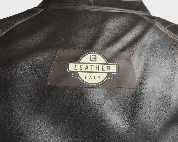 "LEATHER FAIR" patch on a distressed black leather jacket.